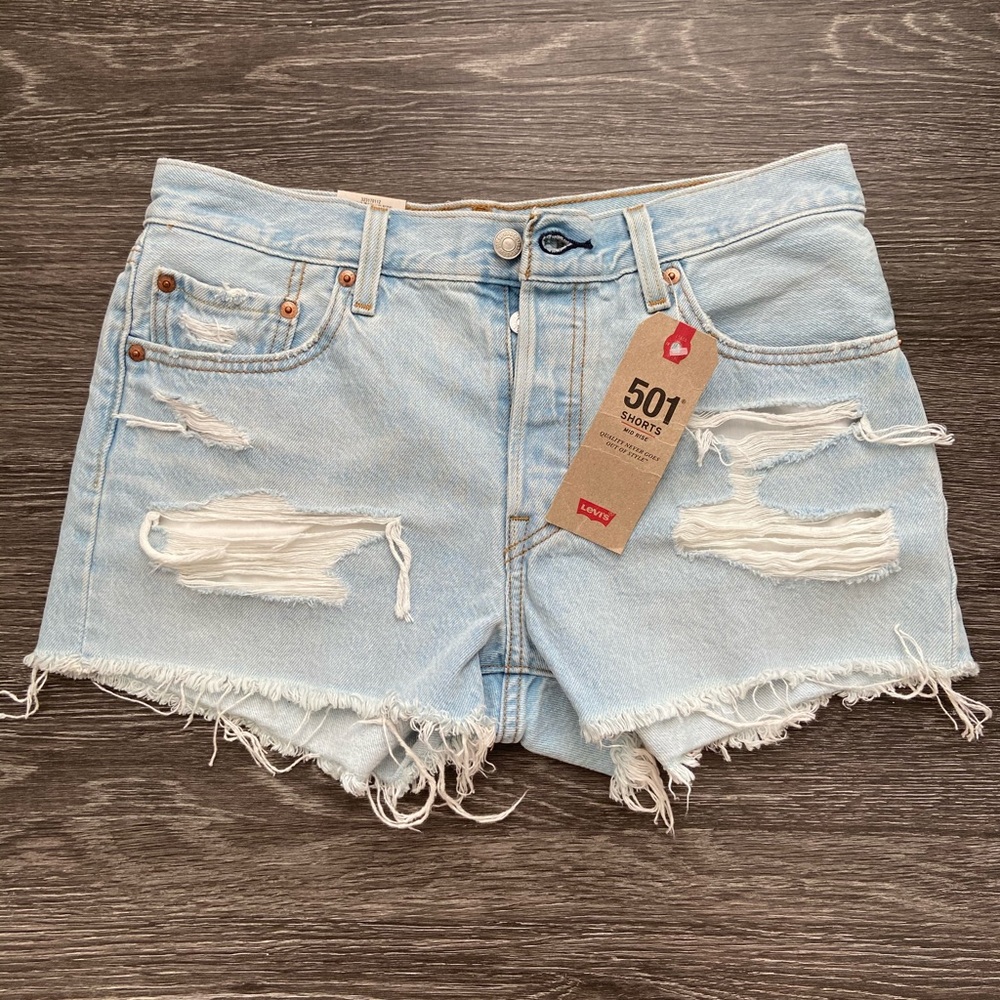 Levi mid rise distressed shorts